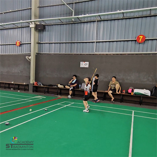 Badminton class for primary school children KL showing technique improvement