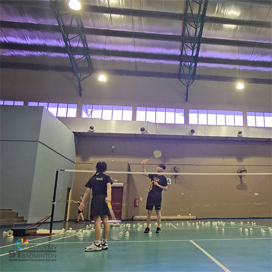 Certified badminton coach near Wangsa Maju teaching proper techniques