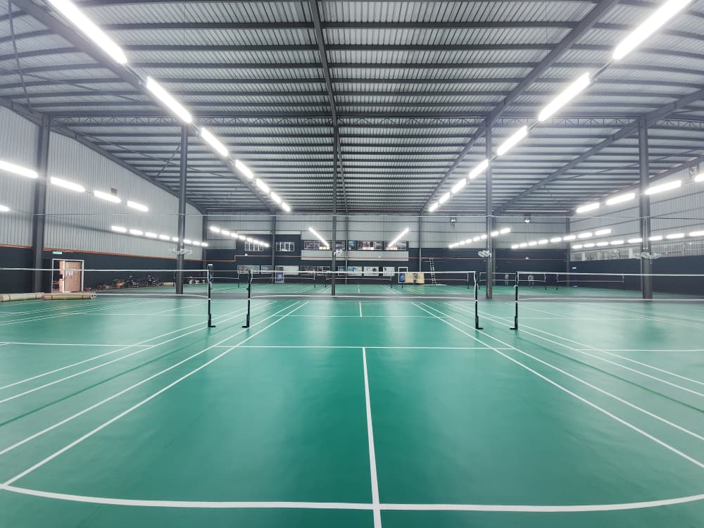 Ảnh sân Ampang Badminton Centre từ trang thông tin địa điểm chính thức. Không phải ảnh lớp học STBA.