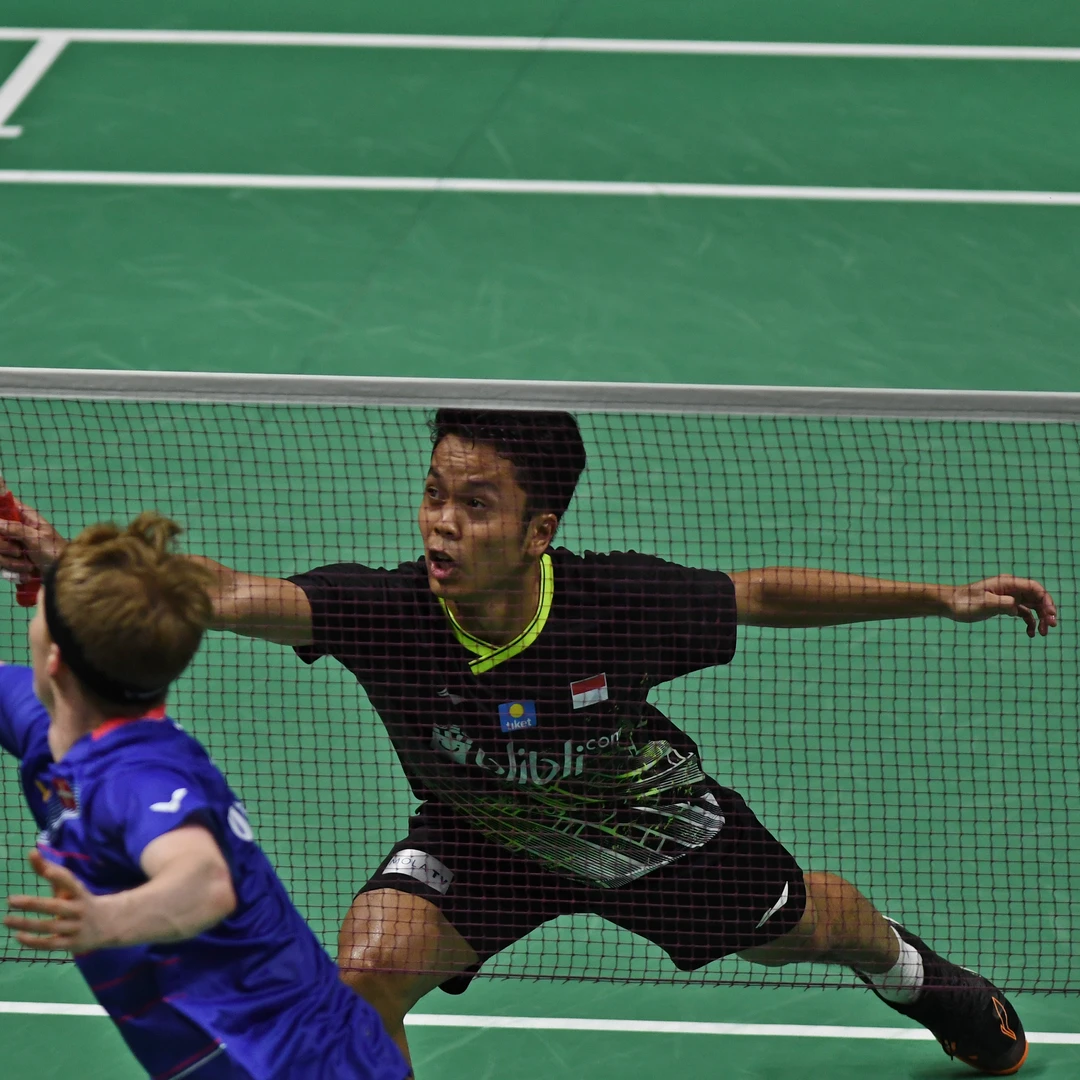 Anthony Sinisuka Ginting at the net against Anders Antonsen in the 2020 Indonesia Masters final Anthony Sinisuka Ginting at the net against Anders Antonsen in the 2020 Indonesia Masters final