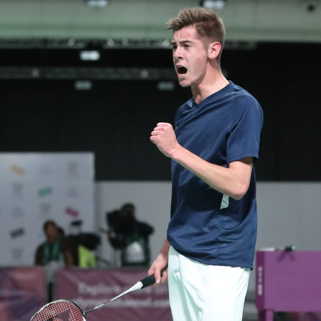 Arnaud Merkle celebrating Arnaud Merkle roaring in celebration after winning a point at the 2018 Youth Olympic Games