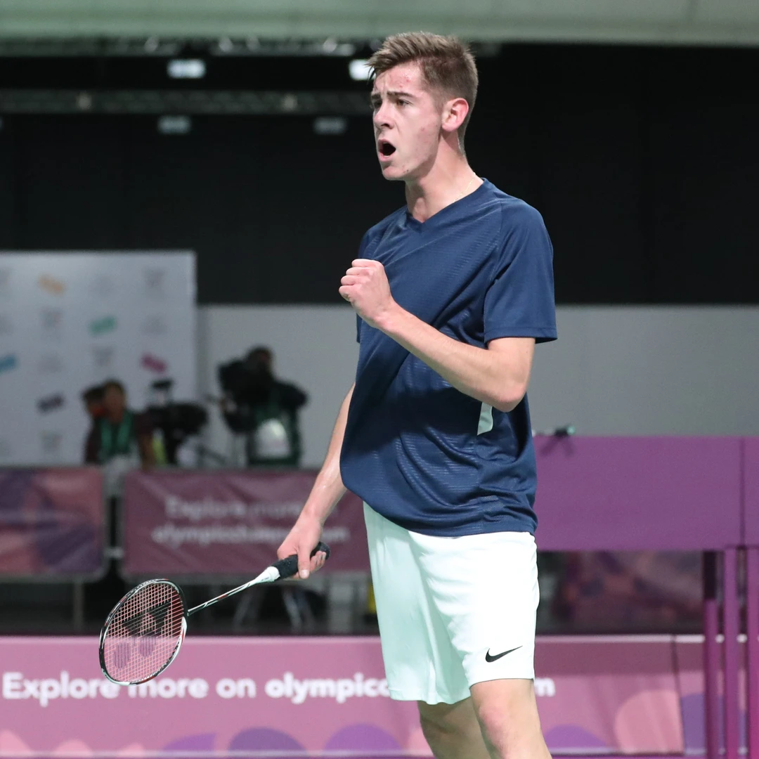 Arnaud Merkle celebrating a point Arnaud Merkle pumping his fist after winning a point at the 2018 Youth Olympic Games in Buenos Aires