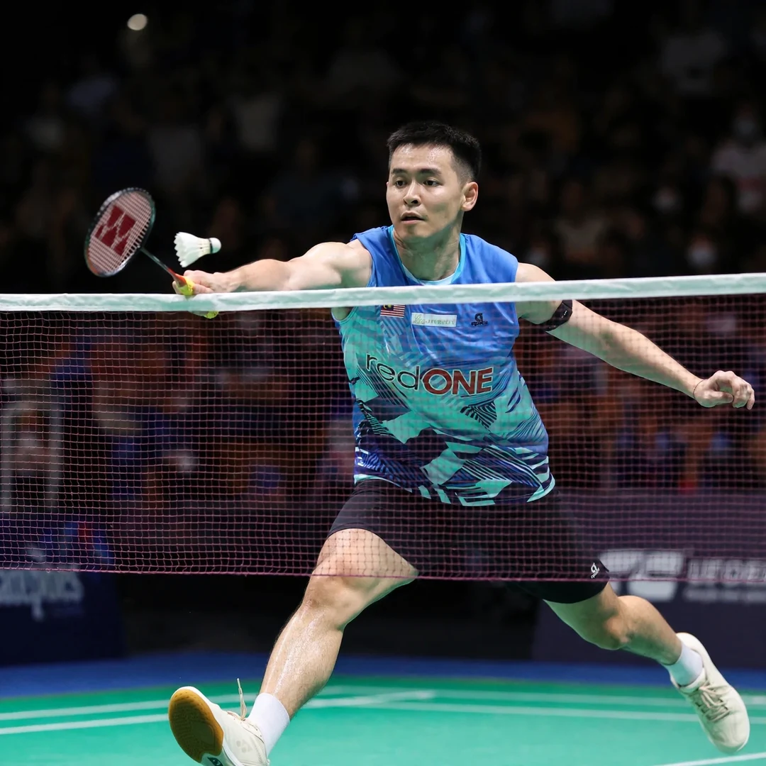 Cheam June Wei tumbling net shot Cheam June Wei playing a tumbling net shot (AI-generated)