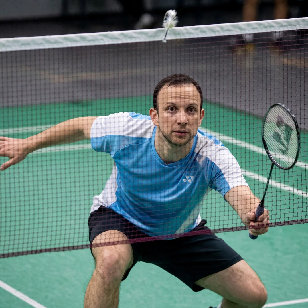Kevin Cordon playing a tumbling net shot (AI-generated) Kevin Cordon playing a tumbling net shot (AI-generated)