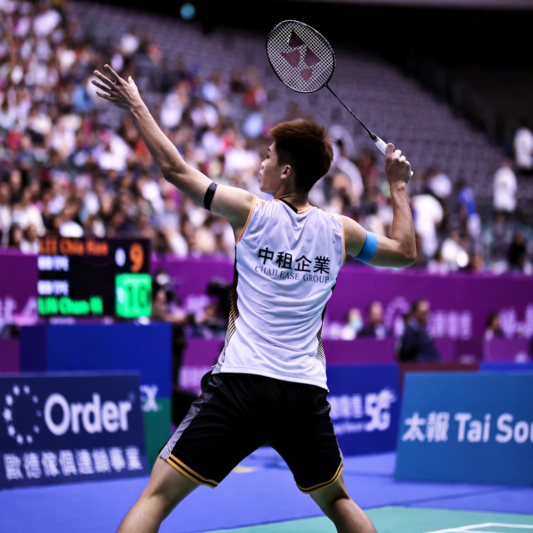 Lee Chia Hao overhead clear Lee Chia Hao playing an overhead clear from the backhand corner (AI-generated)