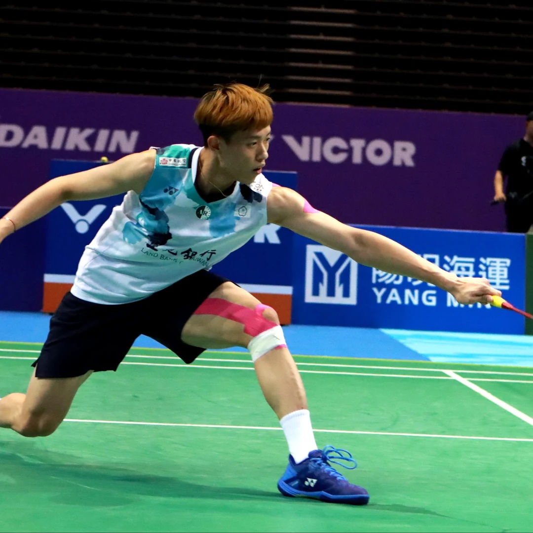 Lin Chun-Yi lunging at the net at the 2023 Kaohsiung Masters Lin Chun-Yi net play at the 2023 Kaohsiung Masters (Wikimedia Commons)