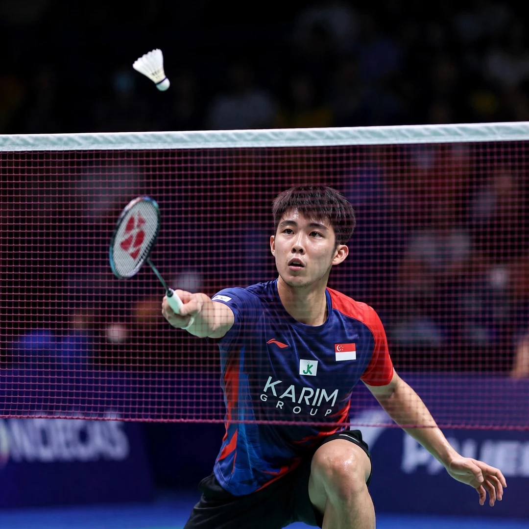 Loh Kean Yew net play and court coverage Loh Kean Yew net play (AI-generated)
