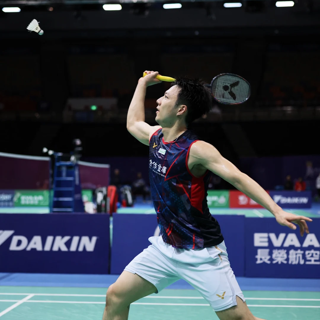 Wang Tzu Wei backhand clear Wang Tzu Wei playing an overhead backhand clear from the deep backhand corner (AI-generated)
